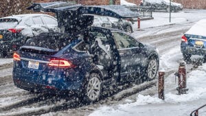 Teslas Silly Falcon Wing Doors Have One Great Function