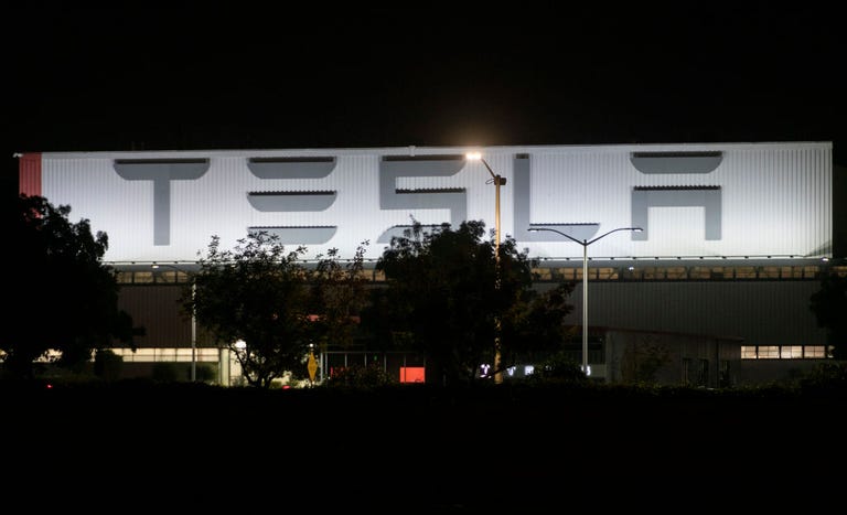 tesla-logo-is-seen-at-its-factory-in-fremont-california-on-news-photo-1588013368.jpg?crop=1xw:0.82183xh;center,top&resize=768:*