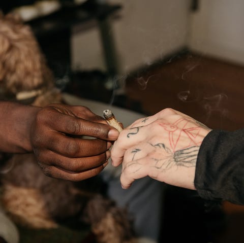 rage and release members passing a joint before a local run on december 19 2021