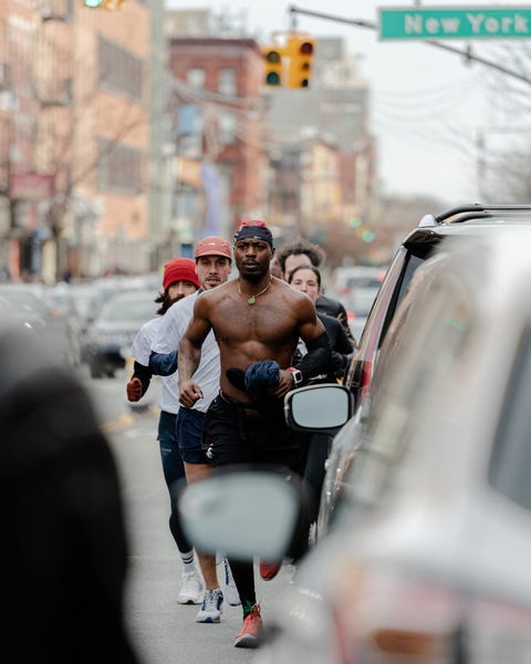 Thai Richards leads a group run through the streets of Bed Stuy, Brooklyn on December 19 2021 thai richards leads a group run through the streets of bed stuy, brooklyn on december 19 2021