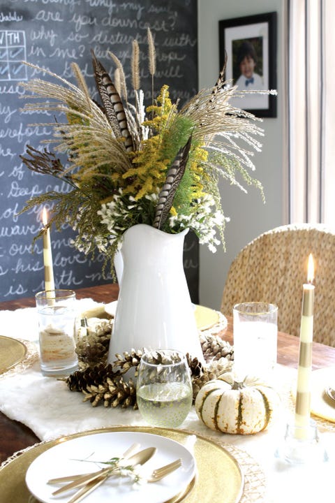 Centrepiece, Table, Feather, Room, Interior design, Tablecloth, Twig, Dining room, Plant, Furniture, 