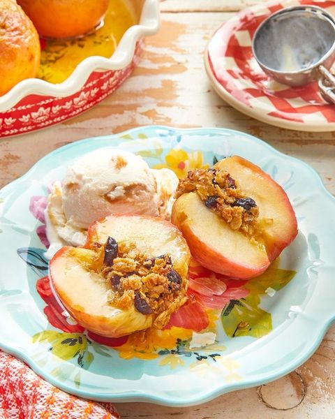 baked apples with crumble on plate with ice cream