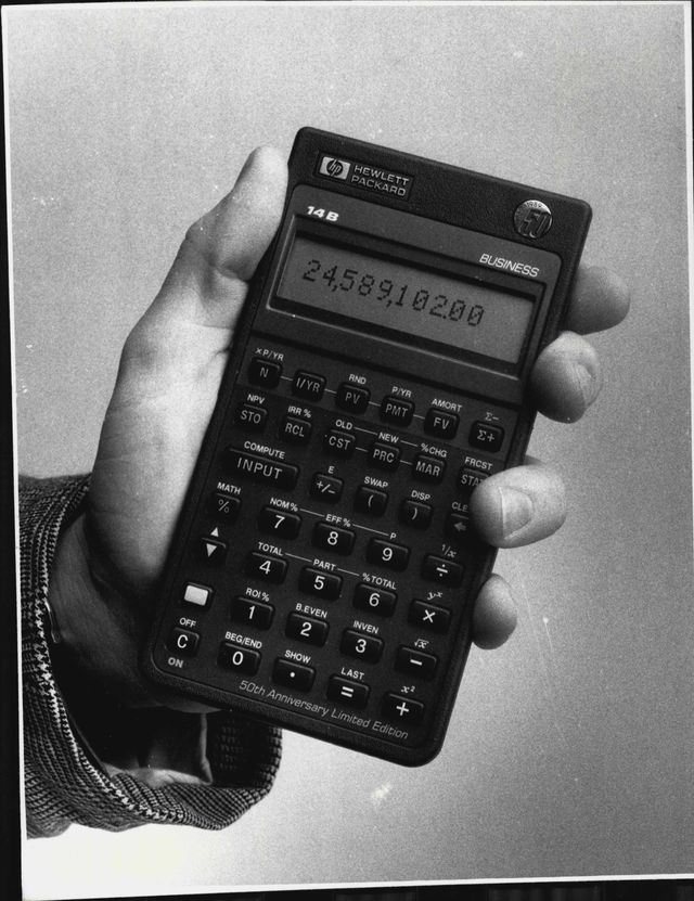 the hewlett packard 14b calculator50th anniversary limited for the past 10 years the sign of a through that  had a large, well dressed business excutive has not barrely  machine in the early been the charcoal grey, well pressed 1970s