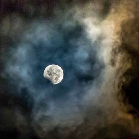 A Penumbral Lunar Eclipse will Take Place on Nov. 29-30 - Eyes on the Skies The-moon-framed-by-ashes-from-the-mount-sinabung-volcano-is-news-photo-1576501630.jpg?crop=0.667xw:1.00xh;0