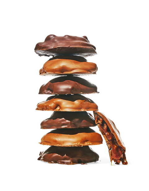 a stack of chocolate turtle cookies