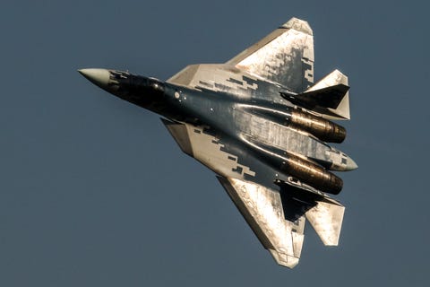 The Sukhoi Su-57 jet fighter performs its flight display at... the sukhoi su 57 jet fighter performs its flight display at