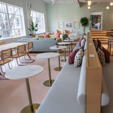 terrazzo tables in a millennial pink kitchen space