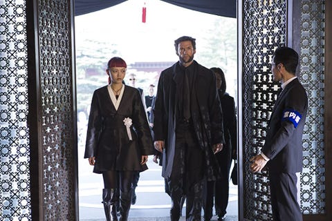 the wolverine   rila fukushima as yukio and hugh jackman as loganwolverine, walking side by side