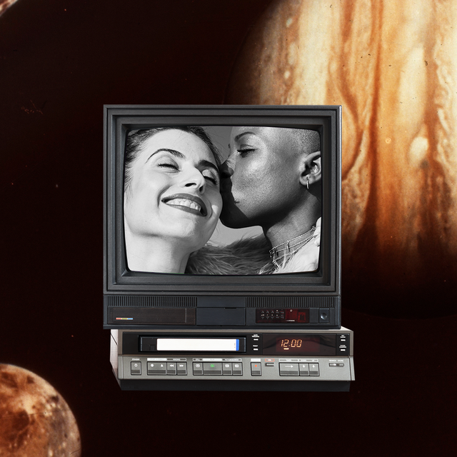 astrology dating show, in which two women kiss on a tv screen with a background of planets in the sky