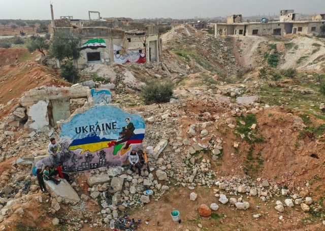 syria conflict russia ukraine mural