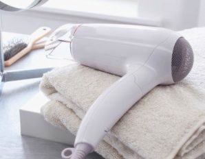 drying hair with fan