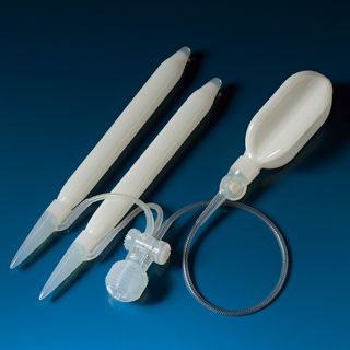 the coloplast inflatable penile implant device shows the cylinders, pump and reservoir