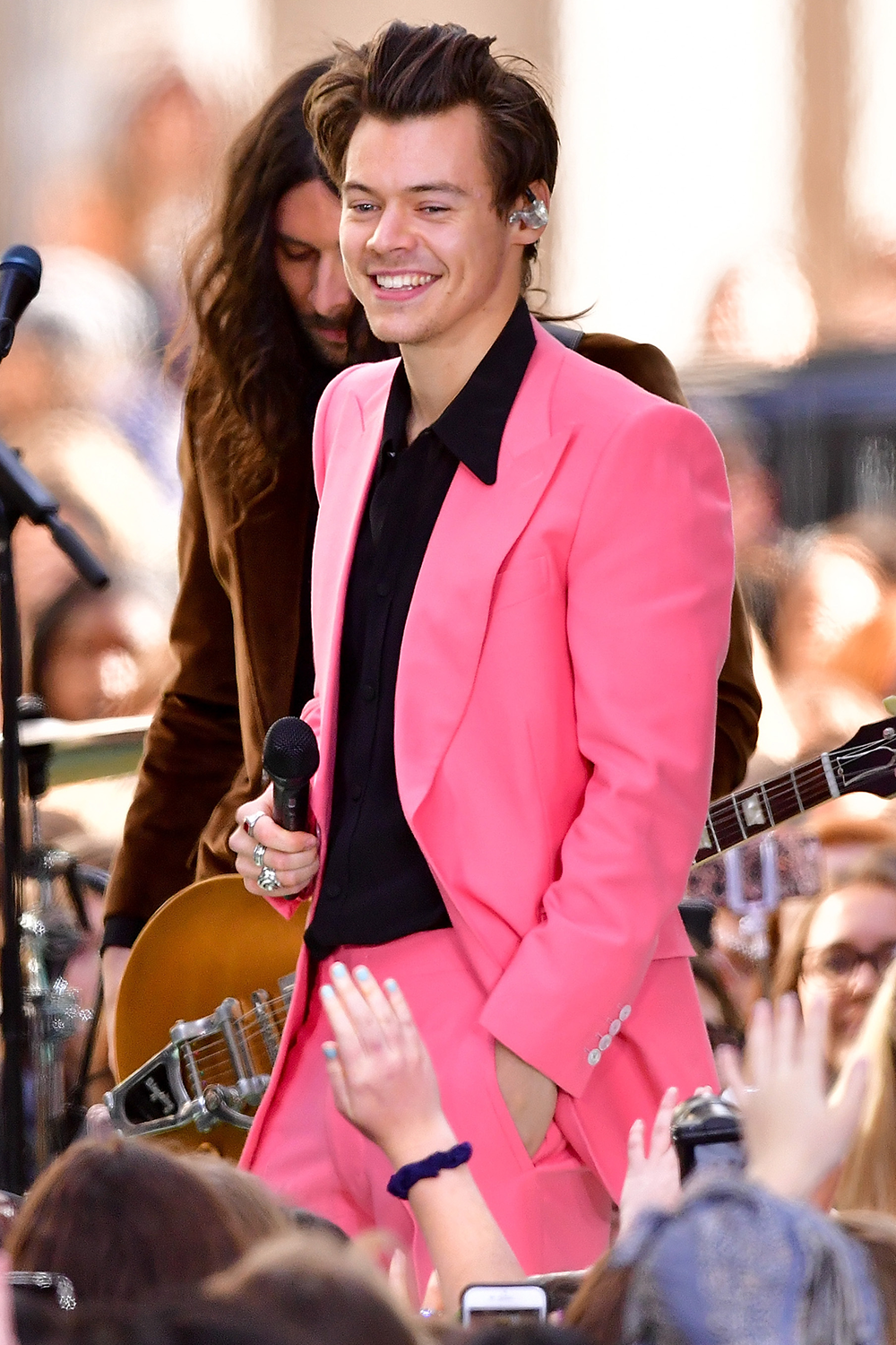 harry styles pink gucci suit