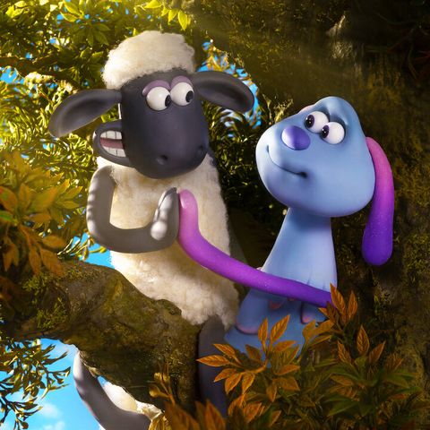 shaun highfives an alien in a scene from a shaun the sheep movie farmageddon, a good housekeeping pick for best toddler movies