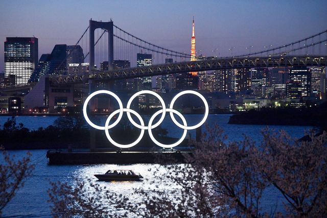 tokyo, japan   march 25 a boat sails past the tokyo 2020 olympic rings on march 25, 2020 in tokyo, japan following yesterday’s announcement that the tokyo 2020 olympics will be postponed to 2021 because of the ongoing covid 19 coronavirus pandemic, ioc officials have said they hope to confirm a new olympics date ‘as soon as possible’ photo by carl courtgetty images