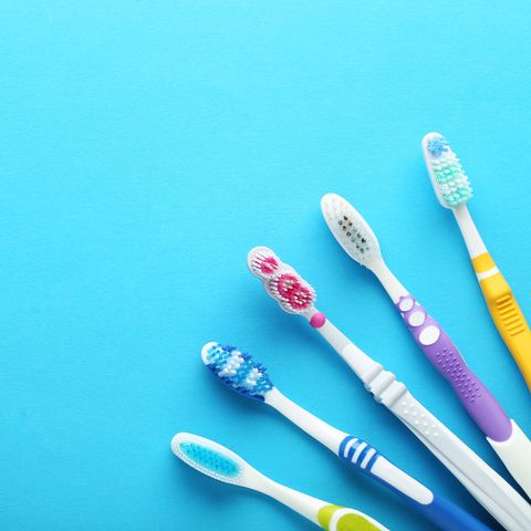 Toothbrushes on blue background