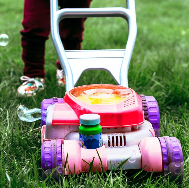 toy lawn mower blowing bubbles