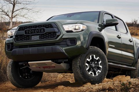 toyota tacoma coming over a crest