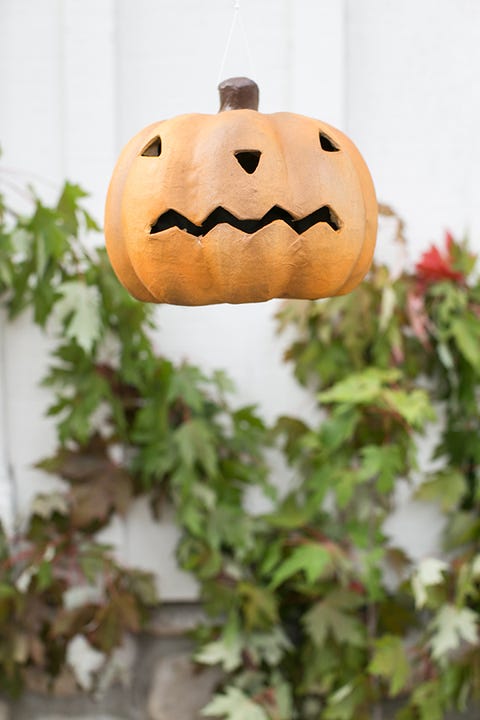 Orange, Plant stem, Creative arts, Peach, Calabaza, Jack-o'-lantern, Toy, Carving, Craft, 