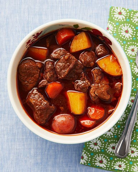 beef stew with carrots and potatoes in bowl