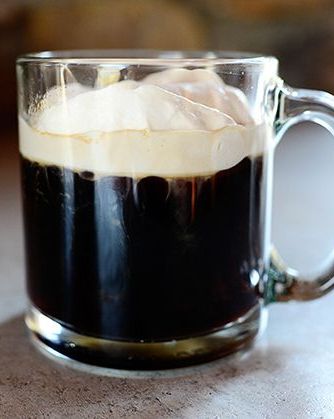 irish coffee in clear mug