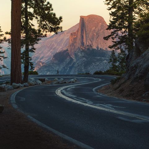 winding road with half dome in yosemite