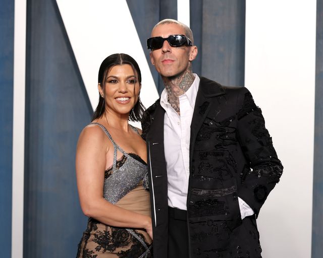 beverly hills, california   march 27 l r kourtney kardashian and travis barker attend the 2022 vanity fair oscar party hosted by radhika jones at wallis annenberg center for the performing arts on march 27, 2022 in beverly hills, california photo by john shearergetty images