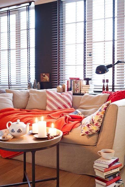 Living room, Interior design, Room, Furniture, Window covering, Red, Window treatment, Curtain, Orange, Couch, 