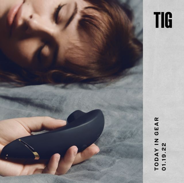 tig jan 19th woman laying on bed with womanizer in hand
