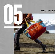 today in gear october 5 2022 man walking while carrying cotopaxi allpa 60l gear hauler tote