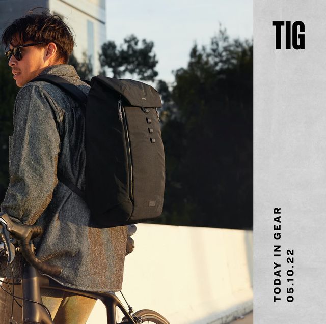 today in gear may 10 2022 man wearing bellroy venture backpack 22l leaning on bike