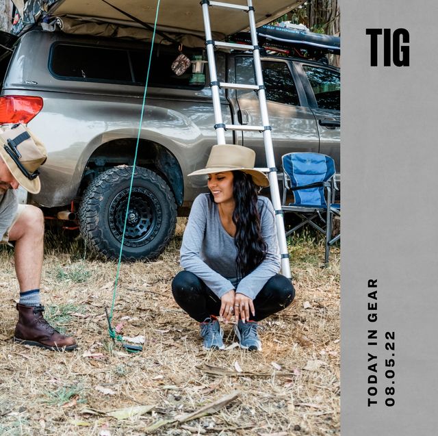 today in gear august 5 2022 man wearing the tactical extreme survival prepper sun hat crouching down next to a woman while petting dog