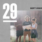 today in gear september 29 2022 a group of three people looking at a map by a river