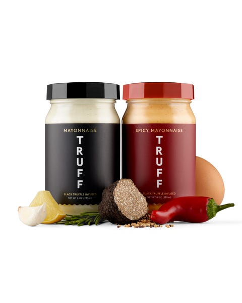 jar of mayo next to jar of spicy mayo surrounded by ingredients