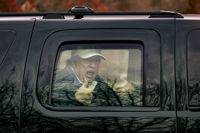 sterling, virginia   november 22 us president donald trump gives thumbs up to supporters from this motorcade after he golfed at trump national golf club on november 22, 2020 in sterling, virginia the previous day president donald trump left the g20 summit virtual event “pandemic preparedness” to visit one of his golf clubs as the virus has now killed more than 250,000 americans photo by tasos katopodisgetty images