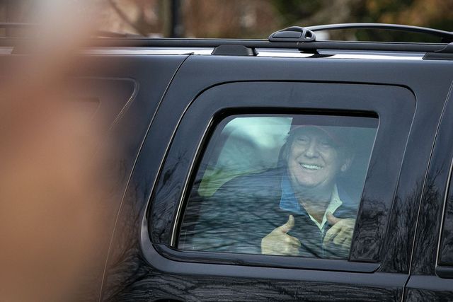 sterling, va   december 13 us president donald trump gives a thumbs up towards supporters as he departs trump national golf club on december 13, 2020 in sterling, virginia photo by al dragogetty images