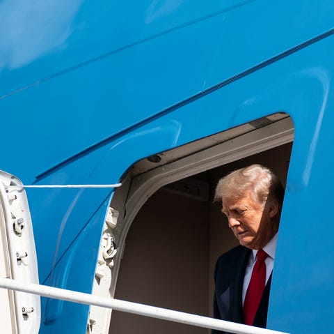 outgoing us president donald trump steps off air force one as he arrives at palm beach international airport in west palm beach, florida, on january 20, 2021     president trump and the first lady travel to their mar a lago golf club residence in palm beach, florida, and will not attend the inauguration for president elect joe biden photo by alex edelman  afp photo by alex edelmanafp via getty images