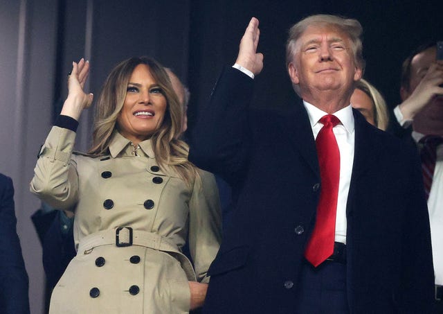 atlanta, georgia october 30 former first lady and president of the united states melania and donald trump do "the chop" prior to game four of the world series between the houston astros and the atlanta braves truist park on october 30, 2021 in atlanta, georgia photo by elsagetty images