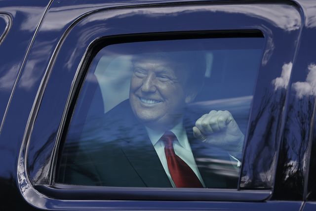 west palm beach, florida   january 20 outgoing us president donald trump waves to supporters lined along on the route to his mar a lago estate on january 20, 2021 in west palm beach, florida trump, the first president in more than 150 years to refuse to attend his successor's inauguration, is expected to spend the final minutes of his presidency at his mar a lago estate in florida photo by michael reavesgetty images