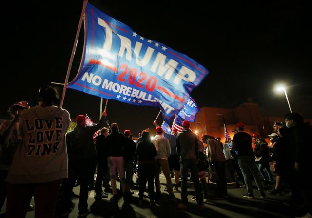 phoenix, arizona   november 07 supporters of president donald trump demonstrate at a ‘stop the steal’ rally in front of the maricopa county elections department office on november 7, 2020 in phoenix, arizona the demonstration began at the state capitol earlier in the day news outlets project that joe biden will be the 46th president of the united states after a victory in pennsylvania with kamala harris to be the first woman and person of color to be elected vice president photo by mario tamagetty images