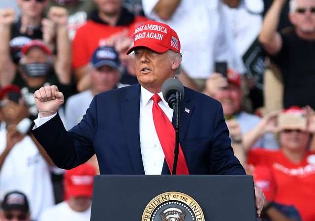 us president donald trump gestures while addressing supporters at a campaign rally outside raymond james stadium on october 29, 2020 in tampa, florida with 5 days until the november 3 election, trump continues to campaign in swing states against democratic presidential nominee joe biden  photo by paul hennessynurphoto via getty images