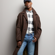 Todd Snyder Sale a model wearing a top coat