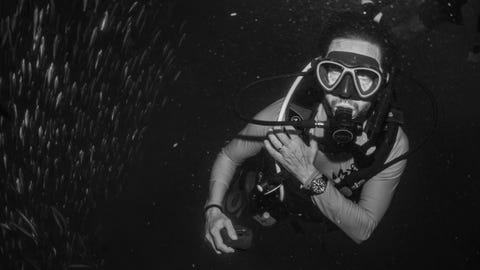 diver underwater in black and white