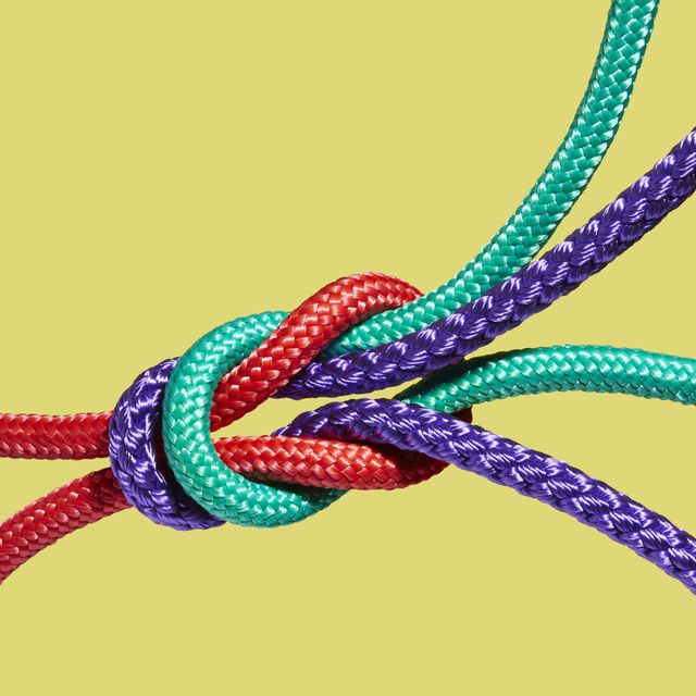 two coloured ropes knotting together