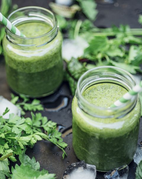 two glasses of wild herb smoothie with apple, banana and lime juice