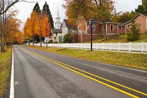 Two-lane highway through small American town