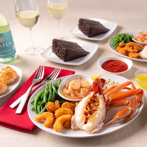 red lobster meal with wine, lobster, cheddar bay biscuits, dessert