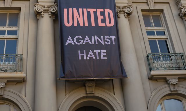a large banner reading "berkeley stands united against hate" hands on the maudelle shirek building aka old city hall at martin luther king jr civic center park in berkeley, california, part of a city led response to "alt right" organizations' "anti marxist" protests in the city, october 6, 2017 photo by smith collectiongadogetty images
