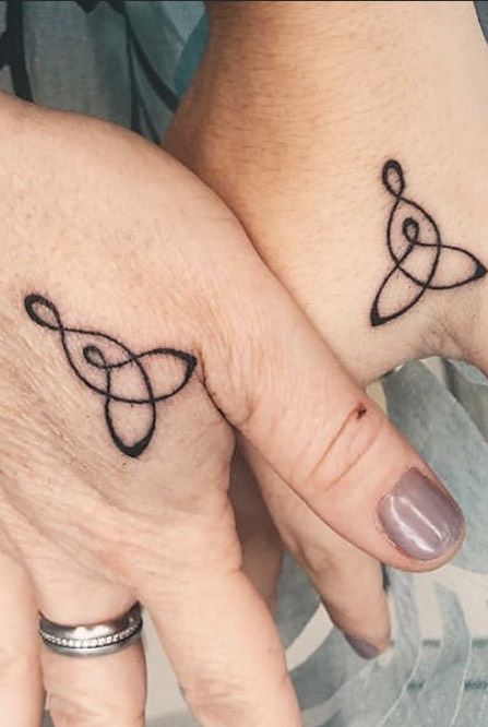 unique symbol mother daughter tattoos
