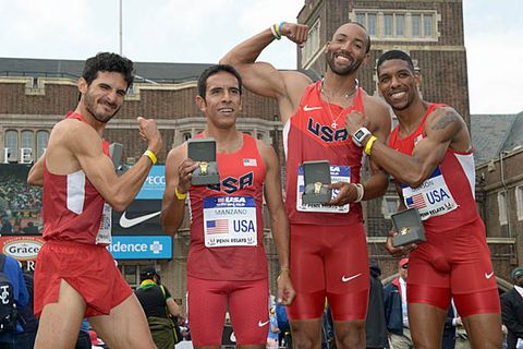 The distance medley relay team of David Torrence (1200m), Leonel Manzano (1600m), Quentin Iglehart-Summers (400m) and Brandon Johnson (800m) flex with their Penn Relays watches after winning the the DMR in 9:28.27.